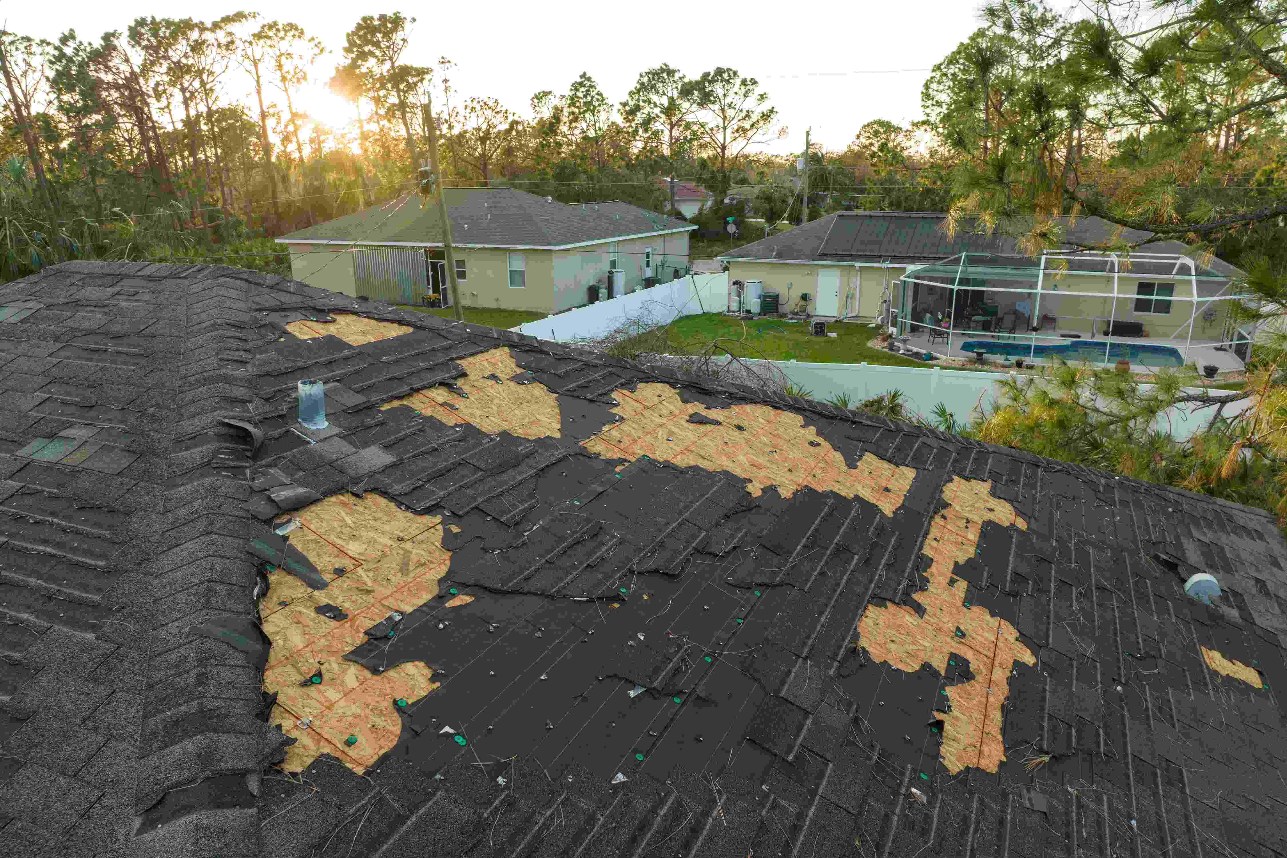 damaged-house-roof-with-missing-shingles-after.jpg